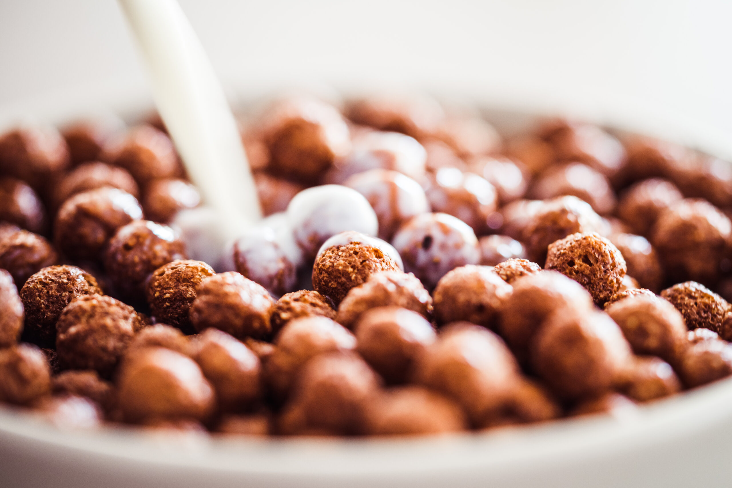 milk-pouring-on-cereal-chocolate-balls-picjumbo-com