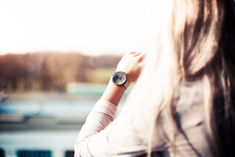 young-woman-with-gray-fashion-watches-enjoying-views-picjumbo-com